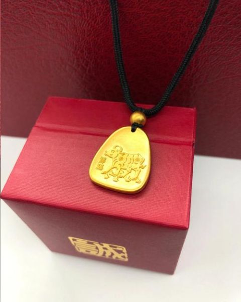 属相牛生肖牌999金（属相牛生肖牌999金保值吗）